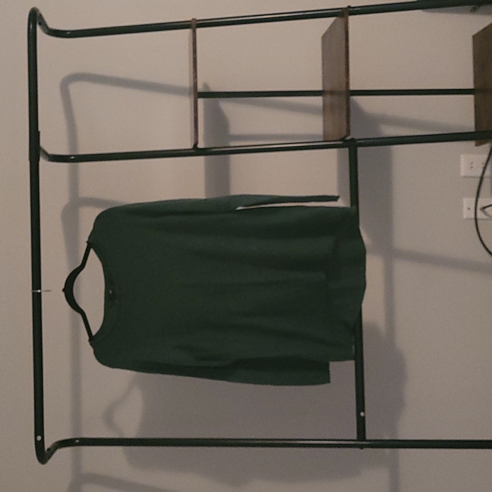 Sweater,  front is shorter than the back.